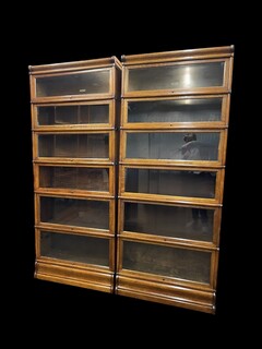 A pair of English Oak Globe Wernicke Bookcases. Six Sections.