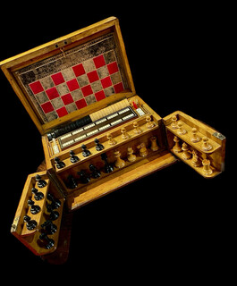 An English 19th Century Games Compendium presented in an Oak Box.