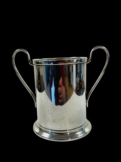 An English Antique Silverplated Bottle Holder.
