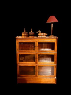 An English Early 20th. Century Mahogany Sectional Bookcase by Minty of Oxford.
